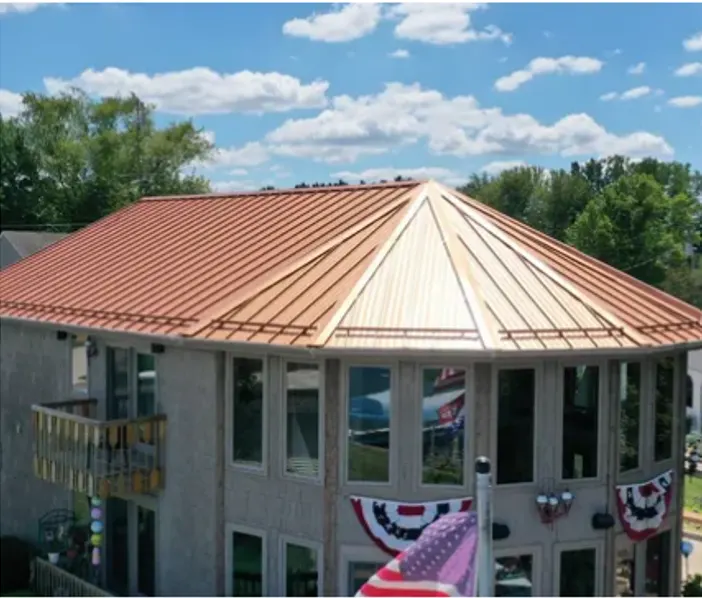 Tarping and dry-in on a Cool Creek commercial roof